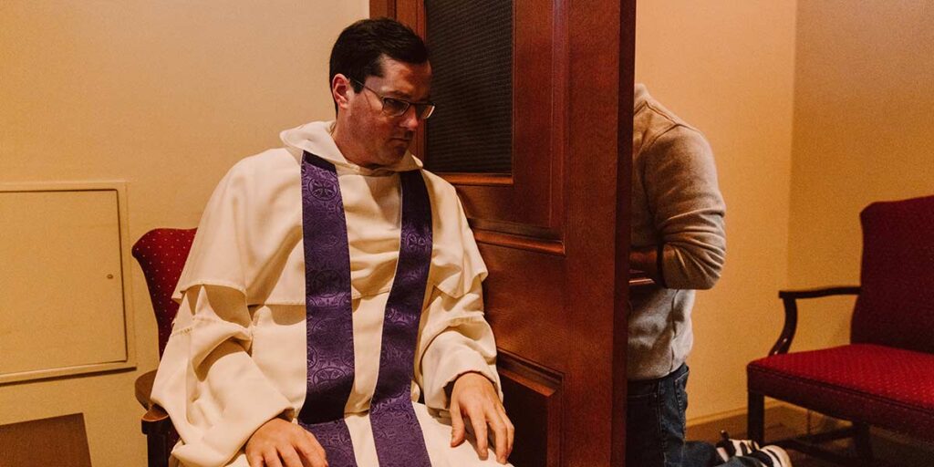 Father Simon hearing confession