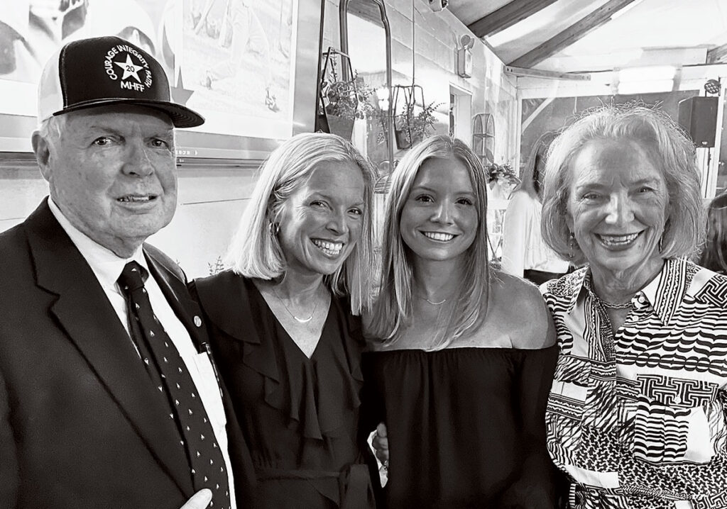 The Flanagan family, from left, Michael Flanagan '67, Christine Griffin Flanagan '91, Christina's daughter, Georgia Griffin, and Kathleen Flanagan.