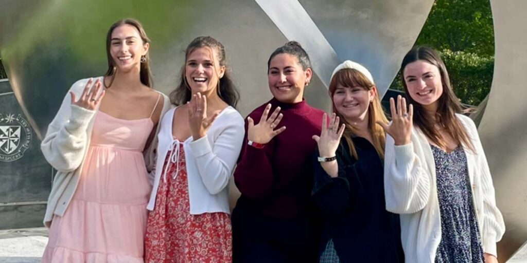 Brockway and classmates pose with their class rings