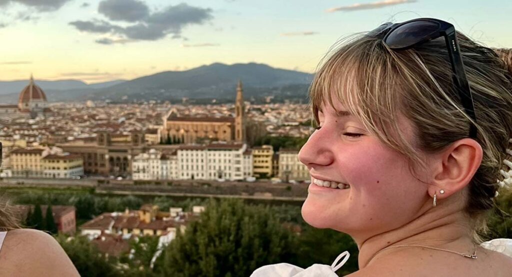 Abby Brockway with Florence, Italy in the background