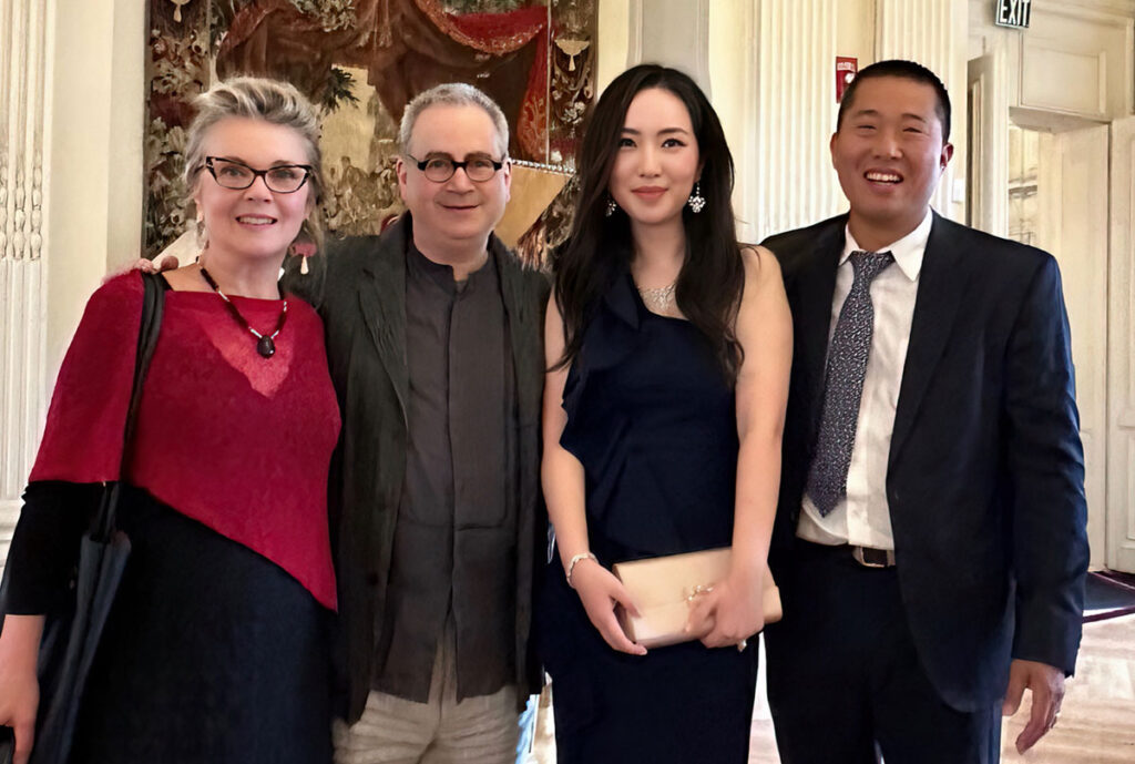 PC art and art history professors joined curator Bing Huang, third from left, at the opening of “The Celestial City: Newport and China” at the Rosecliff mansion in Newport. From left are Joan Branham, Paul Crenshaw, and Eric Sung.