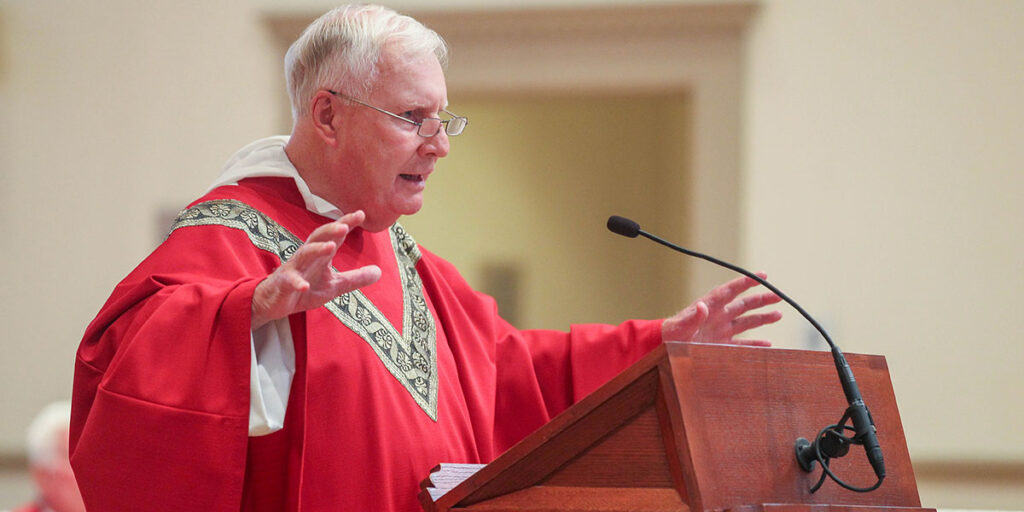 Rev. James Quigley, O.P. '60, celebrates Mass. 