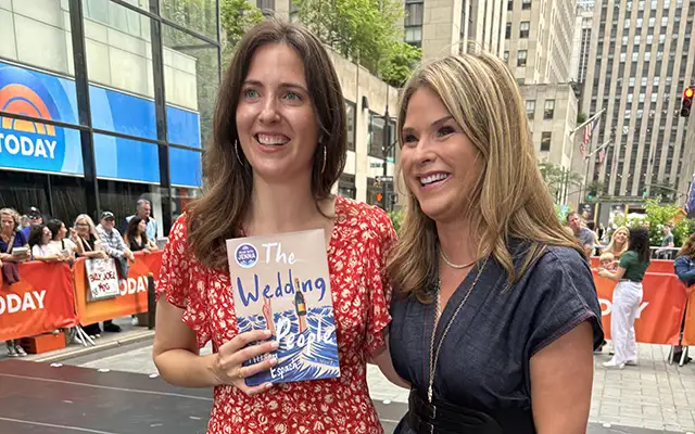 Alison Espach posing with her new book next to Today host